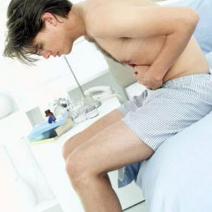 What are the symptoms of colitis?